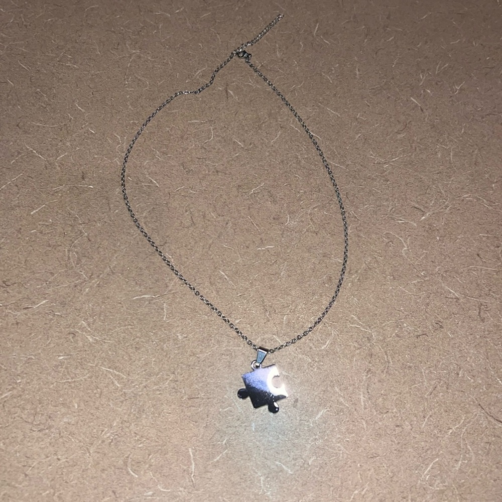 Support Autism Awareness puzzle piece necklace. NWT